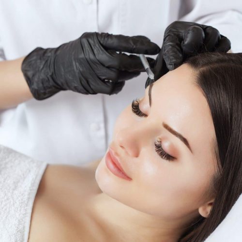 The Doctor Cosmetologist Makes The Rejuvenating Injections Proce