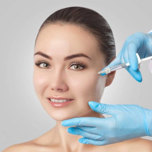 The Doctor Cosmetologist Makes The Rejuvenating Injections Proce